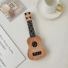 1 Pc, Vintage-Style Mini Ukulele Guitar Decor - Creative & Cute Musical Figurine, No Power Needed, Perfect for Various Room Types.