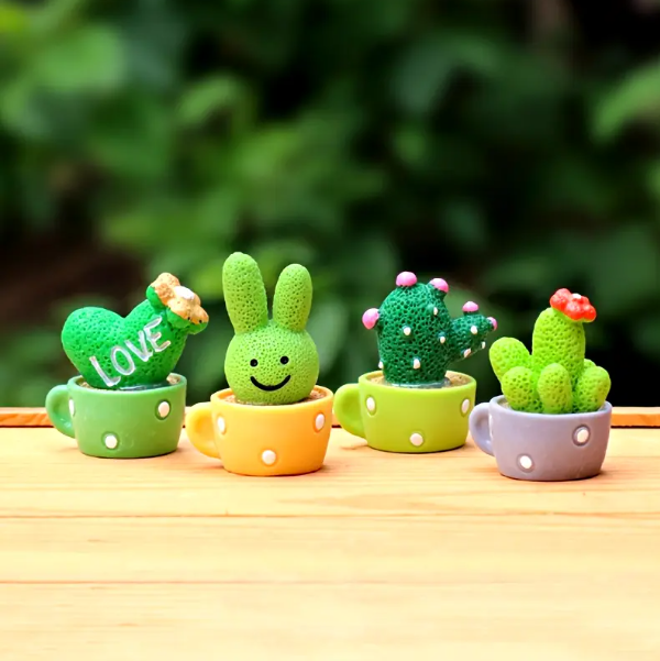 4pcs Mini Cactus Ornaments with Smiling Faces - Durable Plastic Tabletop Décor for Home, Office, Desk.